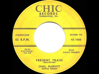 1957 HITS ARCHIVE: Freight Train - Chas. McDevitt Skiffle Group (Nancy Whiskey, vocal)