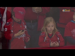 Young girl overjoyed after receiving puck from Brett Connolly